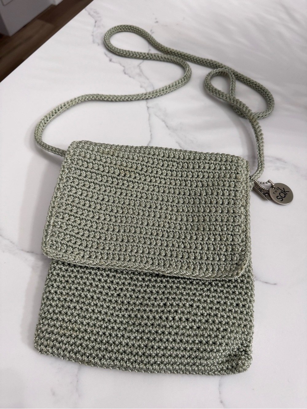 The Sak Sage Green Crocheted Crossbody Bag